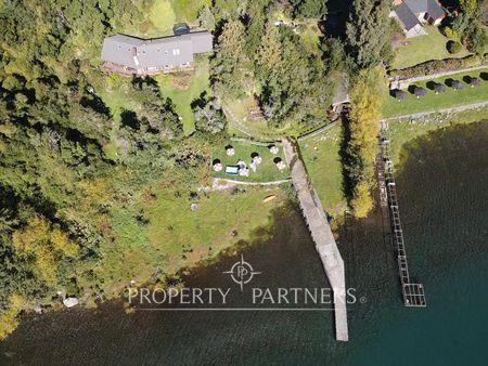 Espectacular Terreno con Casa a Orillas de Lago en Villarrica, Región de Araucania Espectacular Terreno con Casa a Orillas de Lago en Villarrica, Región de Araucania